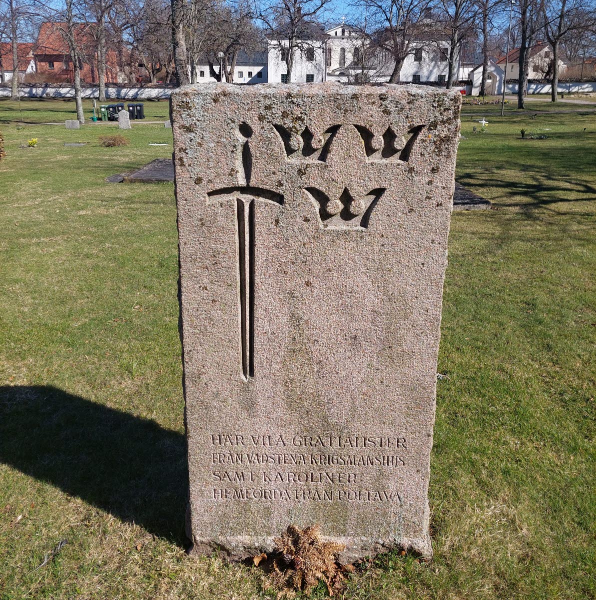 Minnessten Vadstena kyrkogård.